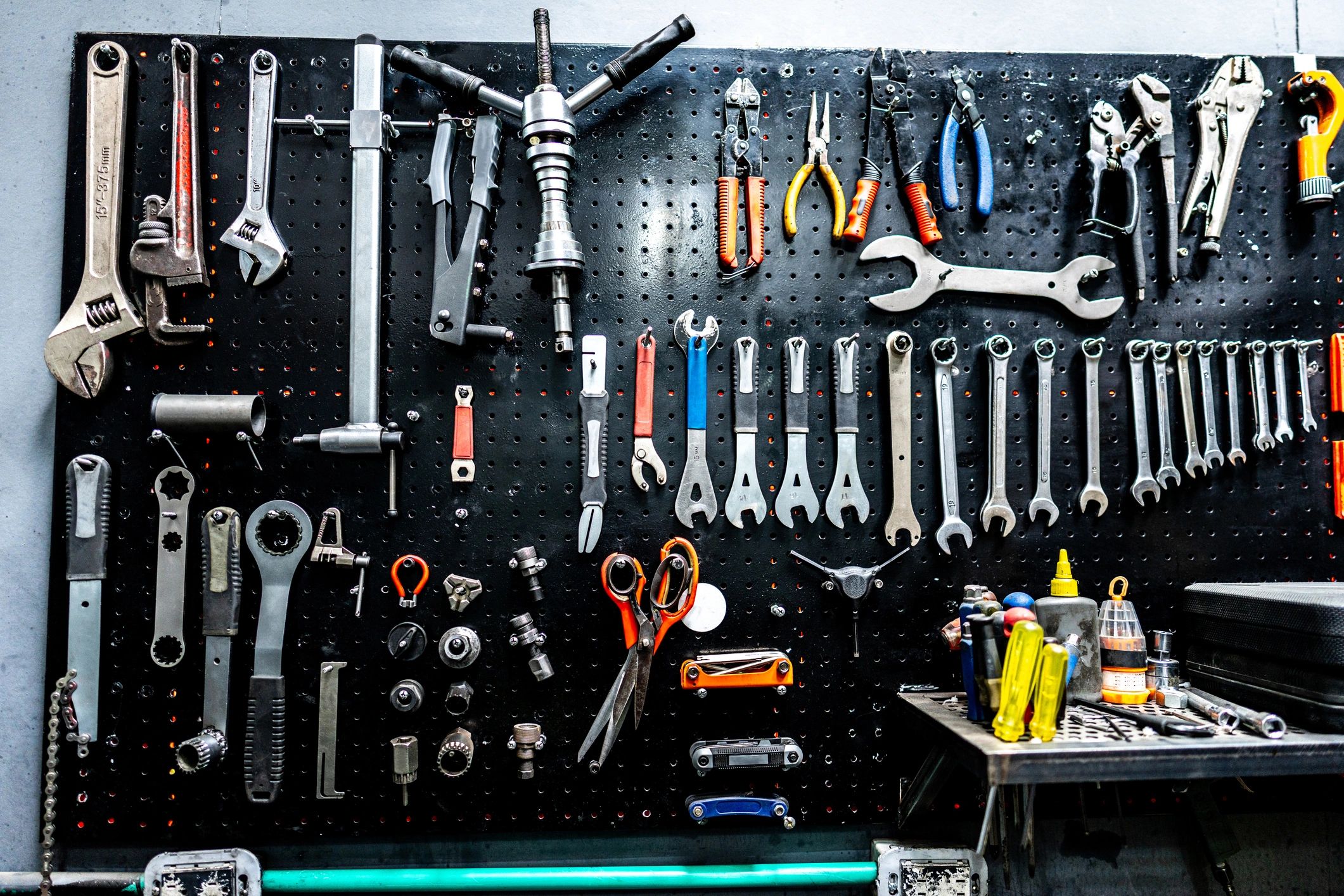 Tool board with hand tools mounted on a wall