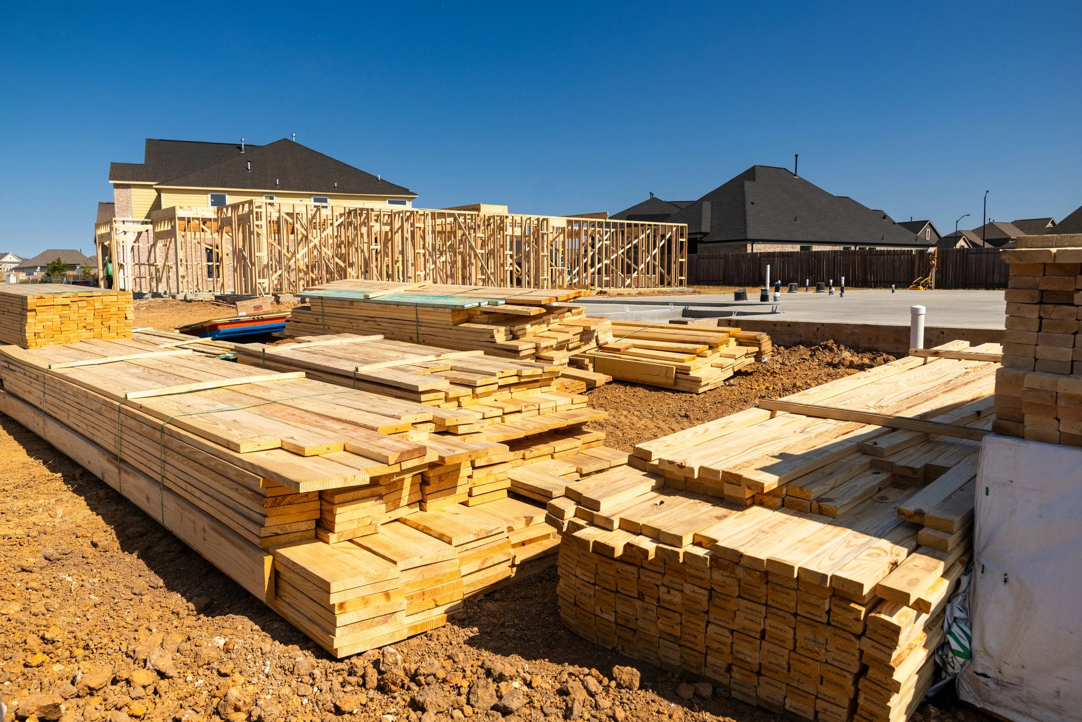 Construction materials and foundation at a job site